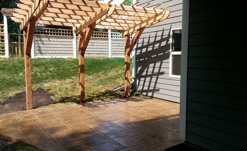Stamped & Stained Concrete Patio with Pergola